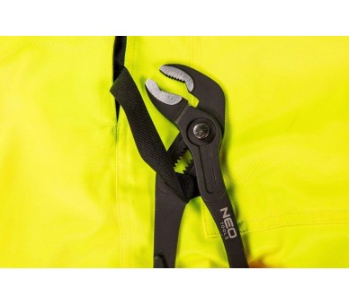 NEO TOOLS Reflexní pracovní kalhoty s laclem, bavlněné, žluté Velikost L/52